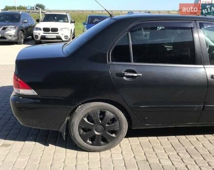 Мицубиси Лансер 2008 в Львове на Automoto.ua Черный Мицубиси Лансер, объемом двигателя 1.6 л и пробегом 356 тыс. км за 4590 $, фото 6 на Automoto.ua