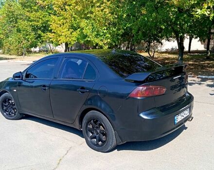 Черный Мицубиси Лансер, объемом двигателя 1.5 л и пробегом 270 тыс. км за 4400 $, фото 4 на Automoto.ua