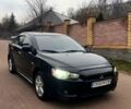 Черный Мицубиси Лансер, объемом двигателя 2 л и пробегом 192 тыс. км за 6300 $, фото 1 на Automoto.ua