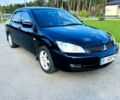 Чорний Міцубісі Lancer, об'ємом двигуна 1.6 л та пробігом 188 тис. км за 5000 $, фото 1 на Automoto.ua