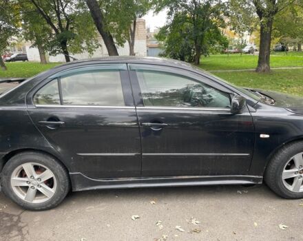 Мицубиси Лансер 2008 в Киеве на Automoto.ua Черный Мицубиси Лансер, объемом двигателя 2 л и пробегом 315 тыс. км за 5000 $, фото 1 на Automoto.ua