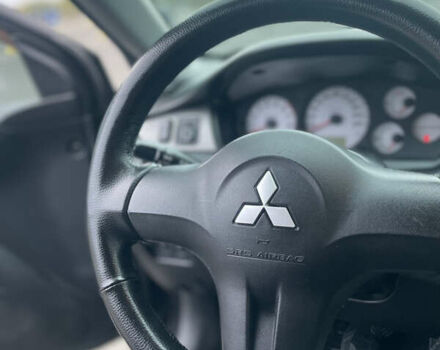 Міцубісі Lancer 2008 у Києві на Automoto.ua Чорний Міцубісі Lancer, об'ємом двигуна 1.58 л та пробігом 300 тис. км за 3800 $, фото 4 на Automoto.ua