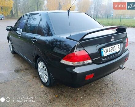 Мицубиси Лансер 2008 в Прилуках на Automoto.ua Черный Мицубиси Лансер, объемом двигателя 1.58 л и пробегом 219 тыс. км за 4900 $, фото 9 на Automoto.ua