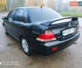 Мицубиси Лансер 2008 в Прилуках на Automoto.ua Черный Мицубиси Лансер, объемом двигателя 1.58 л и пробегом 219 тыс. км за 4900 $, фото 9 на Automoto.ua