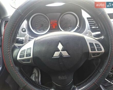 Чорний Міцубісі Lancer, об'ємом двигуна 2 л та пробігом 240 тис. км за 7850 $, фото 24 на Automoto.ua