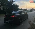 Черный Мицубиси Лансер, объемом двигателя 2 л и пробегом 188 тыс. км за 6900 $, фото 1 на Automoto.ua