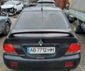 Черный Мицубиси Лансер, объемом двигателя 1.6 л и пробегом 200 тыс. км за 2000 $, фото 3 на Automoto.ua