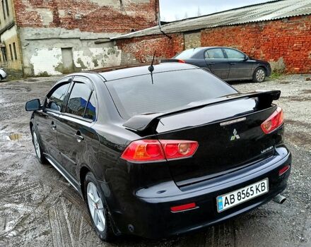 Чорний Міцубісі Lancer, об'ємом двигуна 2 л та пробігом 233 тис. км за 7250 $, фото 4 на Automoto.ua