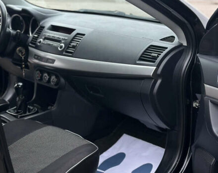 Чорний Міцубісі Lancer, об'ємом двигуна 1.5 л та пробігом 111 тис. км за 6999 $, фото 57 на Automoto.ua