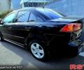 Чорний Міцубісі Lancer, об'ємом двигуна 2 л та пробігом 300 тис. км за 6600 $, фото 1 на Automoto.ua