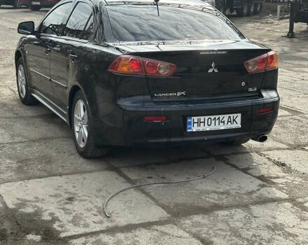 Черный Мицубиси Лансер, объемом двигателя 2 л и пробегом 172 тыс. км за 6100 $, фото 3 на Automoto.ua