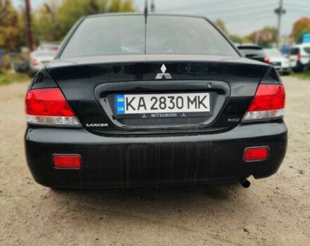 Чорний Міцубісі Lancer, об'ємом двигуна 1.6 л та пробігом 257 тис. км за 4200 $, фото 4 на Automoto.ua