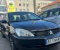 Черный Мицубиси Лансер, объемом двигателя 1.6 л и пробегом 315 тыс. км за 4500 $, фото 1 на Automoto.ua