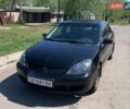 Черный Мицубиси Лансер, объемом двигателя 1.58 л и пробегом 306 тыс. км за 3500 $, фото 1 на Automoto.ua
