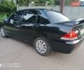 Черный Мицубиси Лансер, объемом двигателя 1.58 л и пробегом 217 тыс. км за 4900 $, фото 10 на Automoto.ua