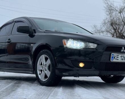 Черный Мицубиси Лансер, объемом двигателя 2 л и пробегом 280 тыс. км за 6800 $, фото 13 на Automoto.ua