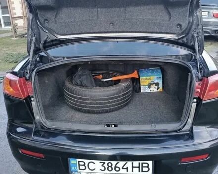 Мицубиси Лансер 2008 в Львове на Automoto.ua Черный Мицубиси Лансер, объемом двигателя 2 л и пробегом 210 тыс. км за 6500 $, фото 12 на Automoto.ua
