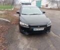 Чорний Міцубісі Lancer, об'ємом двигуна 2 л та пробігом 232 тис. км за 5000 $, фото 1 на Automoto.ua