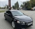 Черный Мицубиси Лансер, объемом двигателя 2 л и пробегом 200 тыс. км за 6800 $, фото 1 на Automoto.ua