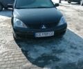 Черный Мицубиси Лансер, объемом двигателя 1.6 л и пробегом 155 тыс. км за 5600 $, фото 1 на Automoto.ua