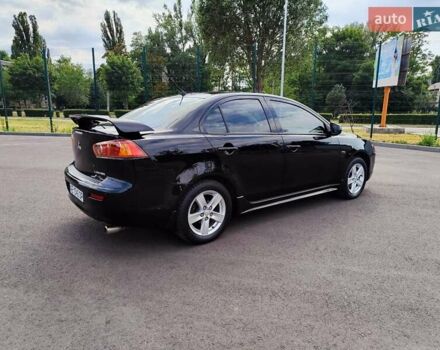 Чорний Міцубісі Lancer, об'ємом двигуна 2 л та пробігом 175 тис. км за 7800 $, фото 7 на Automoto.ua