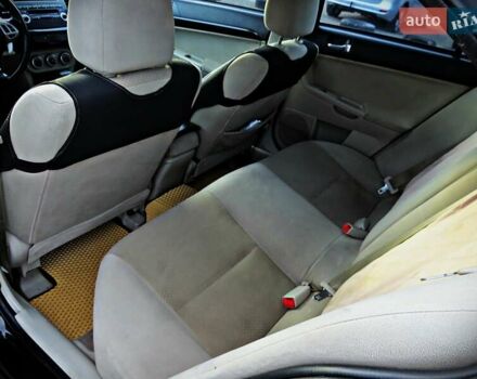 Мицубиси Лансер 2008 в Черкассах на Automoto.ua Черный Мицубиси Лансер, объемом двигателя 2 л и пробегом 178 тыс. км за 7400 $, фото 13 на Automoto.ua