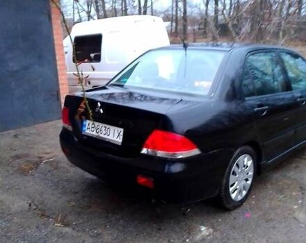 Чорний Міцубісі Lancer, об'ємом двигуна 1.6 л та пробігом 288 тис. км за 3800 $, фото 2 на Automoto.ua