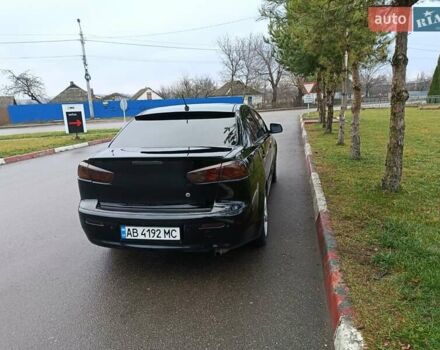 Черный Мицубиси Лансер, объемом двигателя 2 л и пробегом 200 тыс. км за 5100 $, фото 15 на Automoto.ua