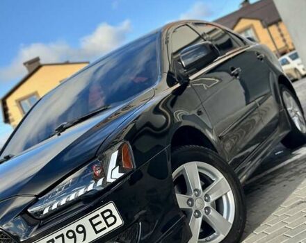 Чорний Міцубісі Lancer, об'ємом двигуна 2 л та пробігом 150 тис. км за 7999 $, фото 1 на Automoto.ua