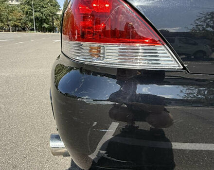 Черный Мицубиси Лансер, объемом двигателя 1.6 л и пробегом 321 тыс. км за 5000 $, фото 13 на Automoto.ua