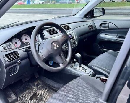 Чорний Міцубісі Lancer, об'ємом двигуна 1.6 л та пробігом 300 тис. км за 5500 $, фото 10 на Automoto.ua