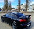 Чорний Міцубісі Lancer, об'ємом двигуна 2 л та пробігом 238 тис. км за 7500 $, фото 9 на Automoto.ua