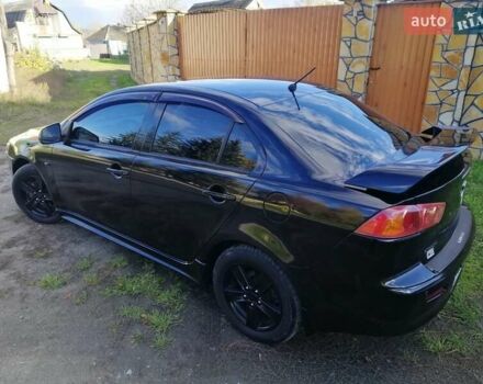 Мицубиси Лансер 2008 в Киеве на Automoto.ua Черный Мицубиси Лансер, объемом двигателя 2 л и пробегом 196 тыс. км за 5500 $, фото 2 на Automoto.ua