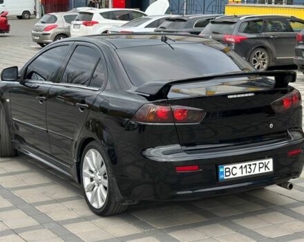 Чорний Міцубісі Lancer, об'ємом двигуна 2 л та пробігом 236 тис. км за 7900 $, фото 2 на Automoto.ua