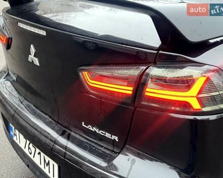 Черный Мицубиси Лансер, объемом двигателя 2 л и пробегом 217 тыс. км за 7000 $, фото 39 на Automoto.ua
