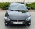 Чорний Міцубісі Lancer, об'ємом двигуна 2 л та пробігом 137 тис. км за 8750 $, фото 1 на Automoto.ua