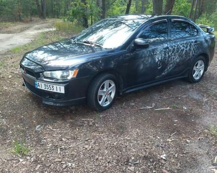 Чорний Міцубісі Lancer, об'ємом двигуна 2 л та пробігом 150 тис. км за 7600 $, фото 12 на Automoto.ua