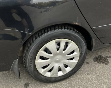 Чорний Міцубісі Lancer, об'ємом двигуна 1.58 л та пробігом 192 тис. км за 4500 $, фото 30 на Automoto.ua