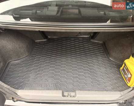 Чорний Міцубісі Lancer, об'ємом двигуна 1.6 л та пробігом 265 тис. км за 4700 $, фото 23 на Automoto.ua