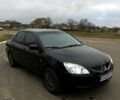 Чорний Міцубісі Lancer, об'ємом двигуна 1.6 л та пробігом 380 тис. км за 4350 $, фото 1 на Automoto.ua