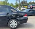 Черный Мицубиси Лансер, объемом двигателя 1.6 л и пробегом 279 тыс. км за 4690 $, фото 5 на Automoto.ua