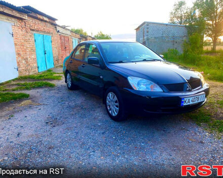 Чорний Міцубісі Lancer, об'ємом двигуна 1.6 л та пробігом 219 тис. км за 4800 $, фото 1 на Automoto.ua