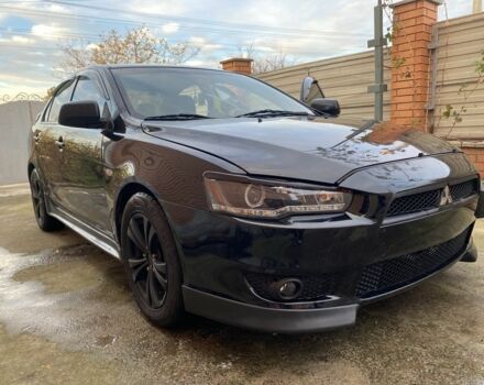 Черный Мицубиси Лансер, объемом двигателя 2 л и пробегом 140 тыс. км за 7200 $, фото 6 на Automoto.ua