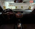 Чорний Міцубісі Lancer, об'ємом двигуна 1.58 л та пробігом 212 тис. км за 5500 $, фото 7 на Automoto.ua