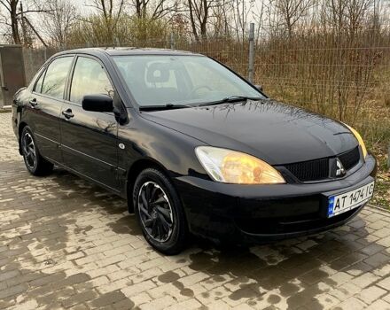 Черный Мицубиси Лансер, объемом двигателя 1.6 л и пробегом 240 тыс. км за 4200 $, фото 7 на Automoto.ua