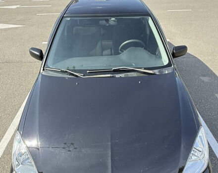 Черный Мицубиси Лансер, объемом двигателя 1.6 л и пробегом 321 тыс. км за 5000 $, фото 9 на Automoto.ua