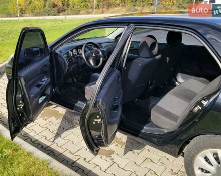 Міцубісі Lancer 2008 у Тернополі на Automoto.ua Чорний Міцубісі Lancer, об'ємом двигуна 1.58 л та пробігом 182 тис. км за 5600 $, фото 13 на Automoto.ua