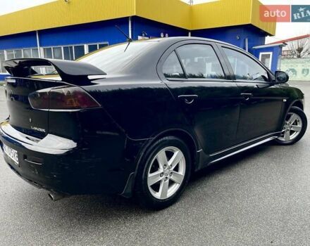 Чорний Міцубісі Lancer, об'ємом двигуна 2 л та пробігом 217 тис. км за 5600 $, фото 5 на Automoto.ua