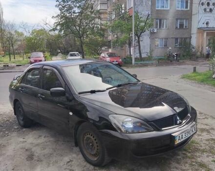 Чорний Міцубісі Lancer, об'ємом двигуна 1.58 л та пробігом 204 тис. км за 4700 $, фото 1 на Automoto.ua