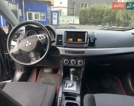 Чорний Міцубісі Lancer, об'ємом двигуна 2 л та пробігом 217 тис. км за 5600 $, фото 12 на Automoto.ua